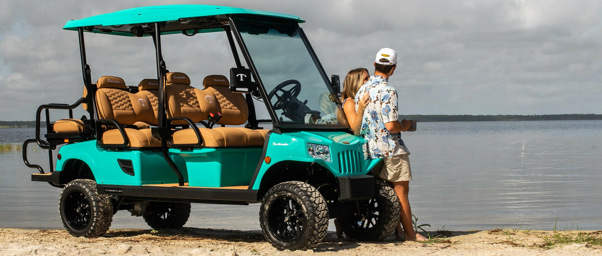 Tomberlin Golf Cart on Beach with Couple