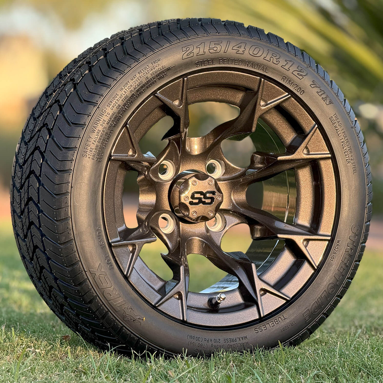 12 inch VULCAN Metallic Bronze Golf Cart Wheels and 215/40-12 Golf Cart Tires Combo in Grass