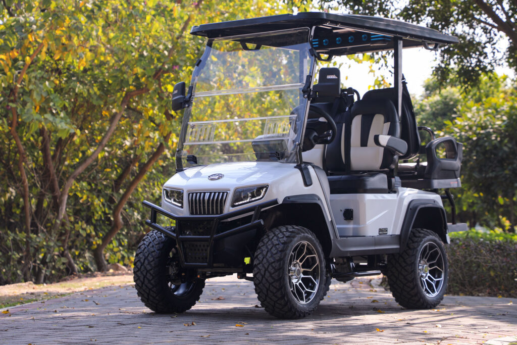10 Best Golf Carts 2026 Evolution D5 Maverick White lifted 2026 Evolution D5 Maverick 4 Plus golf cart parked on a brick path