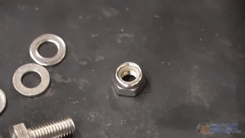 Nylon lock nuts for a Club Car Tempo lithium install Nylon locking nut, washers and bolt from the ALLIED kit used to mount a lithium battery in a 2019 Club Car Tempo golf cart
