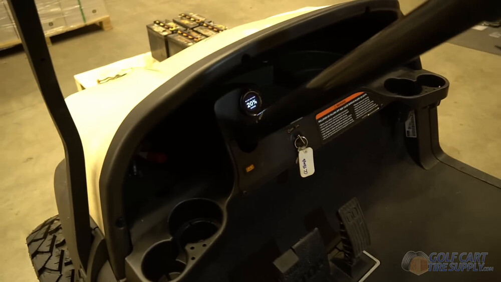 SOC gauge lit up on a Club Car Tempo SOC gauge lit up on the dash of a white 2019 Club Car Tempo golf cart after the lithium conversion