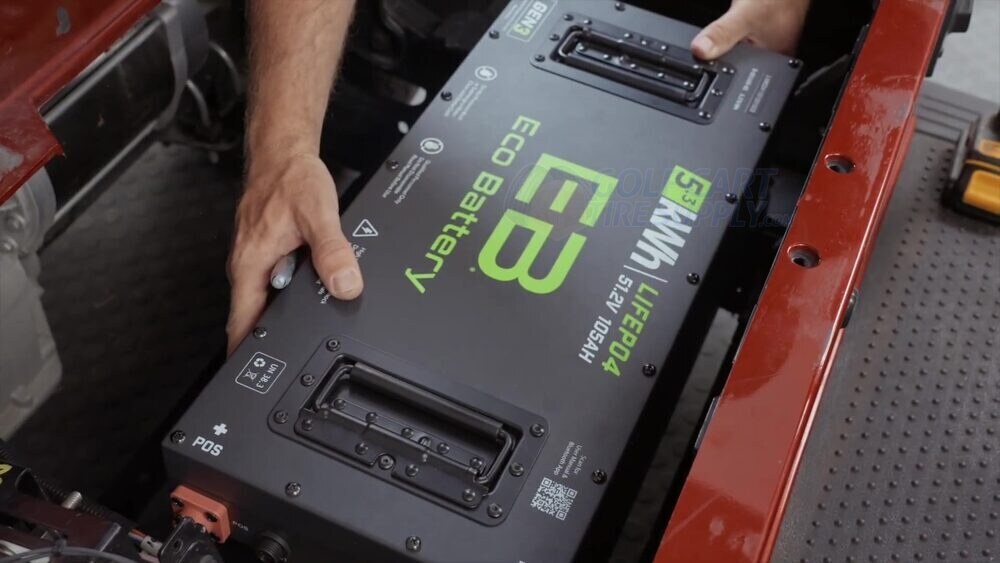 ECO Battery lithium pack lowered into the EZGO RXV battery tray ECO Battery 48V lithium pack being lowered into the EZGO RXV battery tray