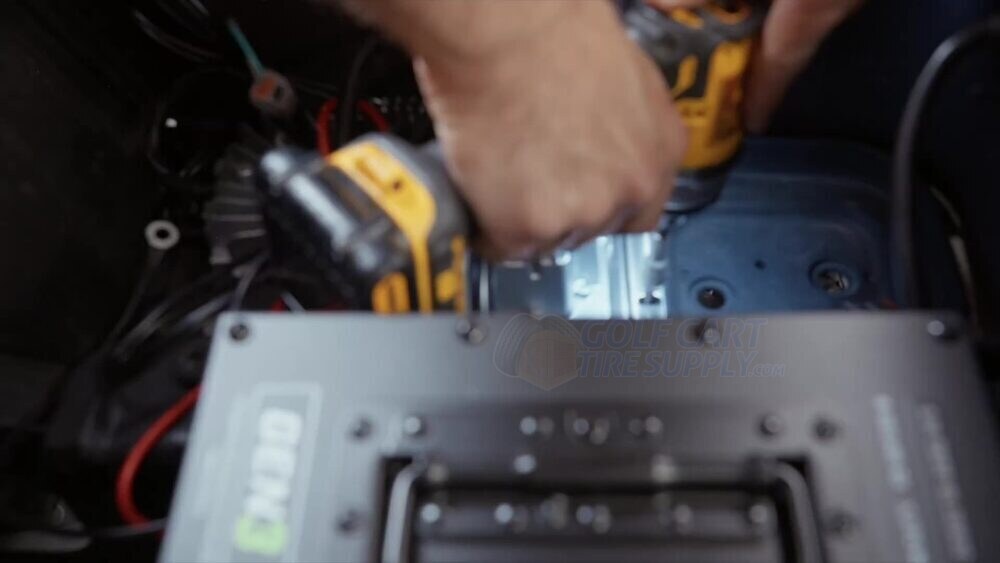 Installing the onboard ECO Battery charger in an EZGO RXV Mounting the onboard ECO Battery charger inside a Gen 1 EZGO RXV