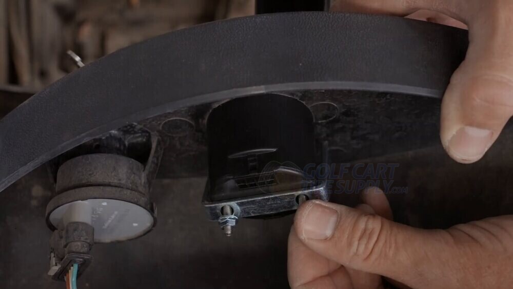 Fastening the ECO Battery state of charge gauge from behind the RXV Gen 2 dash Fastening the ECO Battery state of charge gauge hardware from behind the Gen 2 EZGO RXV dash