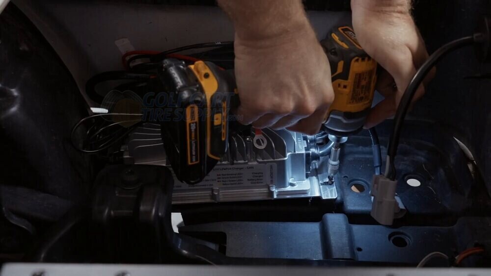 Installing the onboard ECO Battery charger in an EZGO RXV Mounting the onboard ECO Battery charger inside a Gen 2 EZGO RXV