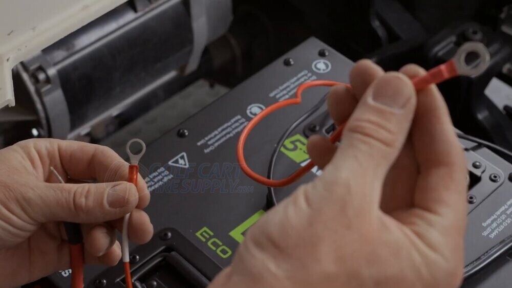 Connecting the A-4136 adapter and charging lead to the ECO battery positive terminal Connecting the A-4136 adapter ring terminal and charging lead to the ECO battery positive terminal