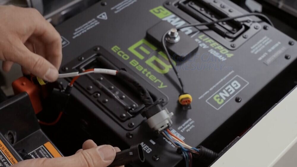 Connecting the charger CAN cable to COM port two on the ECO battery Connecting the charger CAN cable to COM port two on the ECO battery in a Gen 2 EZGO RXV